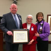 <p>Pat Szechtman, RN, winner of the Helen Meehan Award for Excellence in Nursing, flanked by Susan Brown, RN, chief nursing officer and executive vice president of operations and patient care services and Norman Roth, president of Greenwich Hospital.</p>