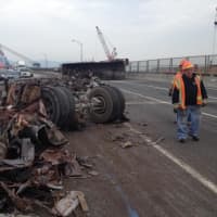 <p>The overturned dump truck on the Tappan Zee Bridge.</p>