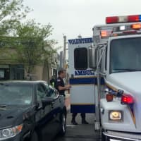 <p>Ambulance arrives at the scene of a Teaneck car accident Saturday.</p>