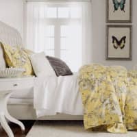 <p>Here, classic sleigh bed styling finds beautiful new life with elegant diamond tufting and the soft yet sunny additions of the Thalia floral bedding and Butterfly Study prints.</p>