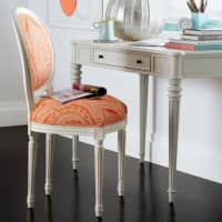 <p>Turn a traditional chair into a colorful statement piece. Dressed in a vibrant tangerine fabric, the Louis XVI-style Josephine armchair becomes an eye-catching piece that livens up any corner, workspace, or dining area.</p>