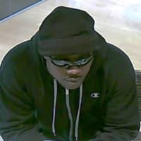 <p>This is the suspect in a robbery Friday morning at the Webster Bank located at 1177 Post Road in Fairfield. pictured suspect entered the bank, approached a teller, and handed her a note. The</p>