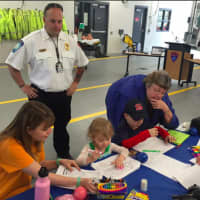 <p>Children color pictures at Stratford EMS&#x27; open house.</p>