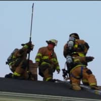 <p>Shelton Volunteer Fire Department members train together.</p>