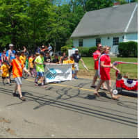 <p>Many groups and clubs in Redding march in the town&#x27;s Memorial Day parade.</p>