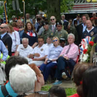 <p>Hillary and Bill Clinton are seated for the town of New Castle&#x27;s Memorial Day ceremony, which followed the annual parade in downtown Chappaqua.</p>