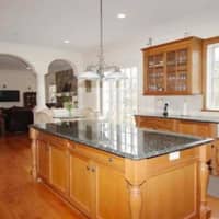 <p>The home also has a large kitchen with huge center island.</p>