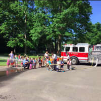 <p>Members of Greenwich Professional Firefighters did fire safety with some kids at the Eastern Greenwich Civic Center as part of safety town.</p>