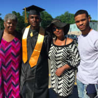 <p>Louis Ray, of Bridgeport, surrounded by family as he prepares for AITE&#x27;s graduation on Tuesday. From left are his grandmother Roxie Ray, Stratford; his mother Karene Thames and his brother Chris Deveaux. Louis Ray will be joining the Navy in December</p>