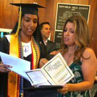 <p>Tanusri Balla, AITE Class of 2016 and Student Council President, goes over some last minute preparation with AITE Principal Tina Rivera, prior to Tuesday&#x27;s graduation. Balla is attending the University of Pennsylvania in the fall.</p>
