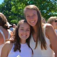 <p>Ninth grade students Avery MacLear of New Canaan, left, received the Paul Johansen Award and Christina Halloran of Darien received the Robert Gamble Award at New Canaan Country School’s 100th Closing Exercises Wednesday.</p>