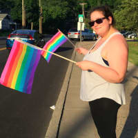 <p>Erin Rogalin, of Shelton, is one of hundreds who attended an Interfaith Vigil in Norwalk on Thursday in memory of the 49 people murdered at a gay nightclub in Orlando.</p>