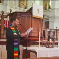 <p>Reading of the names of the 49 victims of the Orlando nightclub shooting on June 12 at the First Congregational Church of Danbury</p>