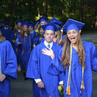 <p>An excited North Salem High School graduate readies for the 2016 commencement.</p>