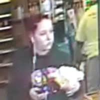 <p>The woman pictured here is a suspect in the theft of a wallet and credit cards from a car parked in Southport.</p>