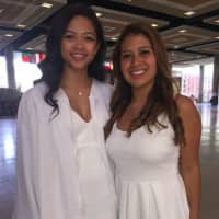 <p>Greenwich High School graduates Patricia David, left, and Leticia De Souza, right, just prior to the school&#x27;s 147th commencement Tuesday. David will attend Iona College while De Souza is attending Sacred Heart University.</p>