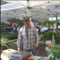 <p>Jose Lopes, who works at Smith&#x27;s Acres LLC in Niantic, was one of the vendors at the Danbury Farmers&#x27; Market&#x27;s opening day on Saturday.</p>