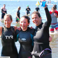 <p>Swimmers celebrate after Saturday&#x27;s Swim Across The Sound Greenwich-Stamford.</p>