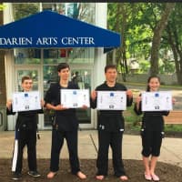 <p>Darien Arts Center awards nine black belts. See story for IDs.</p>