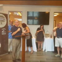 <p>Mayor Mark Boughton addresses about 100 people at the unveiling of CityCenter&#x27;s new Downtown Marketing campaign, held at the new Kennedy Flats apartments.</p>