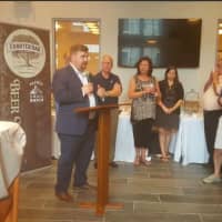 <p>PJ Prunty, executive director of CityCenter Danbury, speaks at the unveiling of CityCenter&#x27;s new Downtown Marketing campaign, held at the new Kennedy Flats apartments.</p>