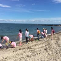 <p>Students from Westport&#x27;s sister city in China, Yangzhou, check out Compo Beach.</p>