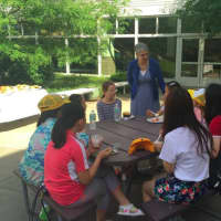 <p>Westport superintendent Colleen Palmer talks with students visiting from Westport&#x27;s sister city in China, Yangzhou.</p>
