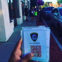 <p>Officer Kevan Taggart offesd safety tips to Pokémon Go players in Darien Tuesday.</p>