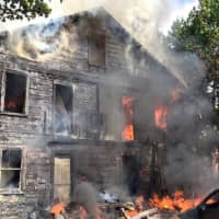 <p>Fourteen people were displaced after a fire destroyed the building at 12 Lexington Ave., in the City of Poughkeepsie.</p>