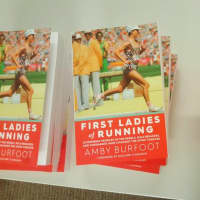 <p>Two books written by legendary runner Amby Burfoot, who was signing them at the Ridgefield Library.</p>