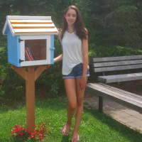 <p>Juliette Castagna installed a Little Free Library at the Ridgefield Parks and Recreation Center&#x27;s playground for her Girl Scout Silver Award project.</p>