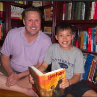 <p>Max Coisman and his dad Alex Coisman of Danbury have read all the Harry Potter books in the series. They are getting ready to buy the eighth book in the series.</p>