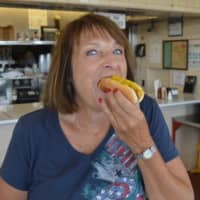 <p>Enjoying a hot dog at Rutt&#x27;s Hut in Clifton.</p>