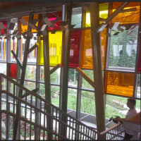<p>Tree theme of metal and glass inside the new Sandy Hook School</p>