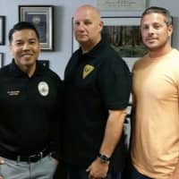 <p>South Gate California Police Captain Darren Arakawa (left) met with Chief James B. O&#x27;Connor and Sgt. Richard Pizzuti (right) to discuss the Pink Patch Project</p>