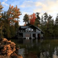 <p>The listing features a boathouse in addition to the nearly 14,000 sq. ft. home.</p>