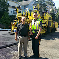 <p>Department of Public Works Commissioner Matthew T. Ruzzo and Officer James Goral on the 500 block of Chase Avenue.</p>
