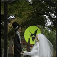 <p>A bride and groom are part of the Halloween display at the Ackerson house in Mahwah.</p>
