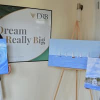 <p>Local artist and writer Peter Saverine is exhibiting his work at Darien Rowayton Bank during the month of August, with 20 percent of all sales benefitting the Darien Arts Center. Peter Saverine with Ellen Bay, Branch Manager at Darien Rowayton Bank</p>