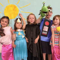 <p>Children enjoying ‘Beginning Acting’, a Kids’ Theatre class. Students in photo from left to right: Arissa Fritz, Charlotte Callahan, Norah Fritz, Natalie Treacy, James Morris, Evelyn Tie, and Quinn Morris.</p>