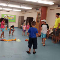 <p>Playing C.A.T.C.H. with Garfield YMCA staff.</p>