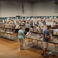 <p>Attendees at the book fair can browse among more than 60,000 books in about 75 categories.</p>