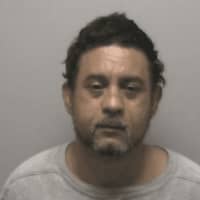 <p>Miguel Rueda of Kent was charged with chocking a woman during an argument in front of a child.</p>