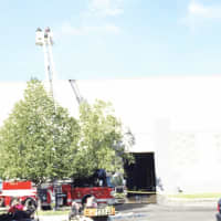 <p>Firefighters doused smoldering &quot;hot spots&quot; at Gap&#x27;s clothing distribution warehouse off I-84 in Fishkill last week. State police announced Tuesday that an investigation found the fire was &quot;intentionally set.&quot;</p>