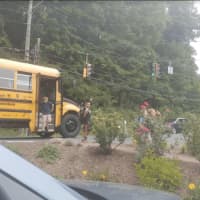 <p>New Fairfield kids come off the bus Wednesday on their first day of school.</p>