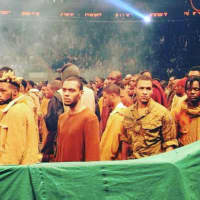 <p>Thomas Pierce, second from right, at Kanye West&#x27;s fashion show, Yeezy Season 3.</p>