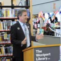 <p>Westport Library Director Bill Harmer welcomes the crowd.</p>