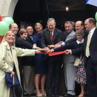 <p>Stamford Mayor David Martin, center, cuts the ribbon a at the new Rogers Inter-School Magnet Extension school Thursday on the first day of school. It&#x27;s located at 200 Strawberry Hill Avenue.</p>