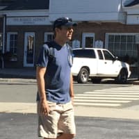 <p>U.S. Sen. Chris Murphy walking towards the Driftwood Café in Southport Friday. Murphy is walking across the state to speak with his constituents.</p>