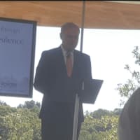 <p>Frank Fetchet, of Voices of September 11th, speaks at the 15th anniversary of 9/11 at Grace Farms</p>